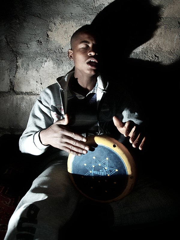 Person Playing a Hand Drum